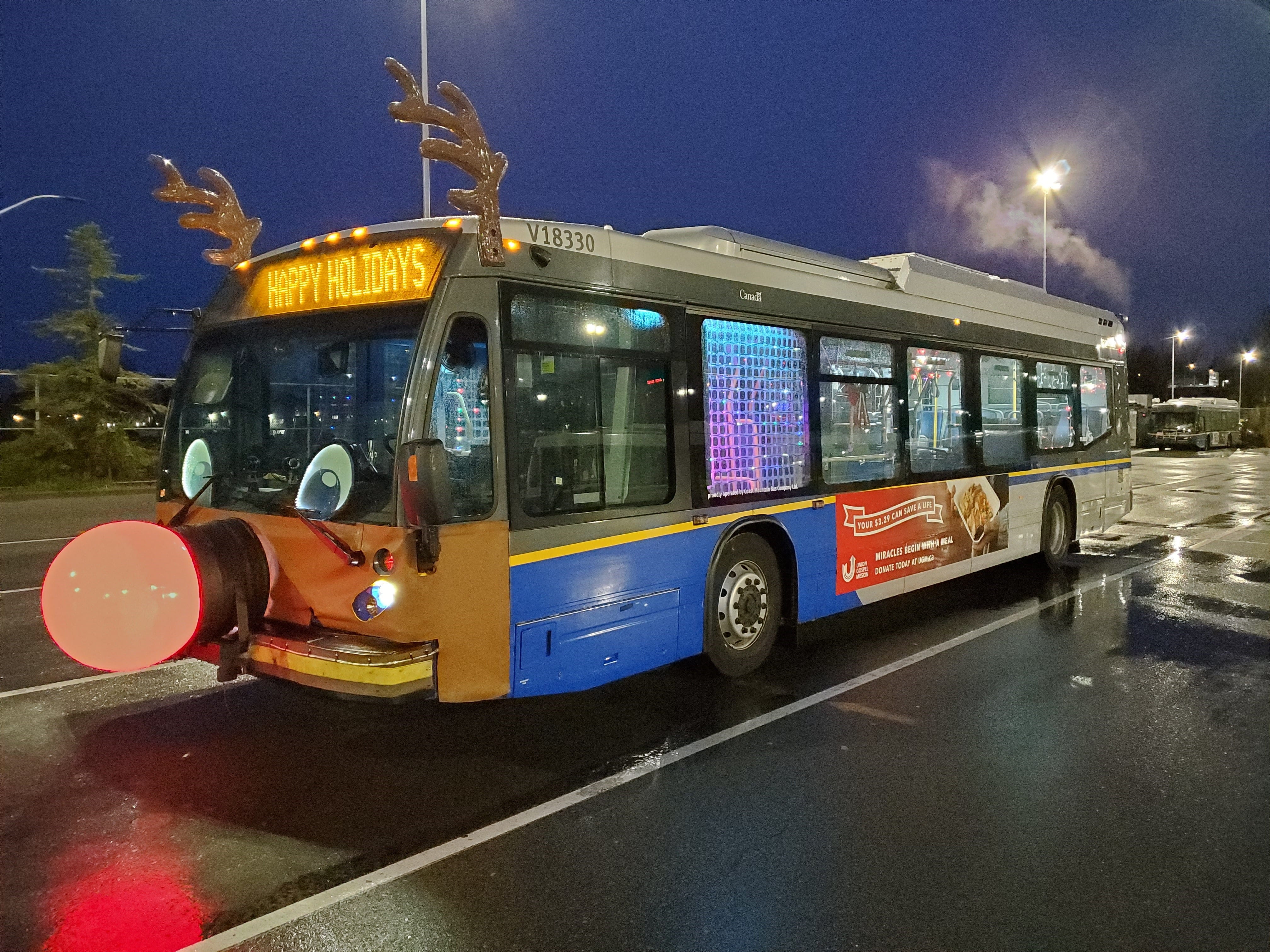 A TransLink reindeer bus with antlers and a bright red nose