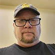 Headshot of busker Gregory Monty