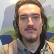 Headshot of busker Luke Edington