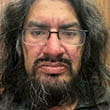 Headshot of busker Marcel Greer