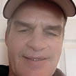 Headshot of busker Peter Stevens
