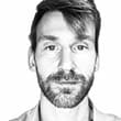 Headshot of busker PIOTR