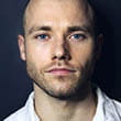 Headshot of busker Ross James Linton