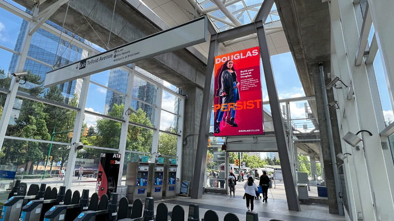 Ad displaying on video wall at Metrotown SkyTrain station