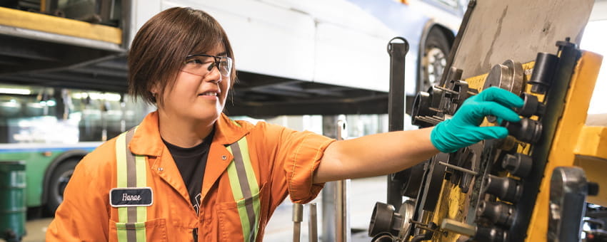 Commercial Transport Mechanic Hana working with machine
