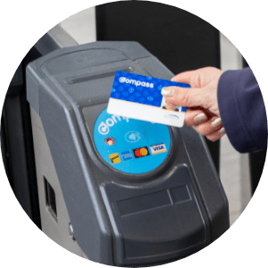 Tap Compass card at fare reader