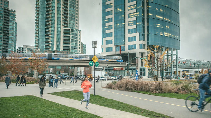 Passengers getting off the route 119 bus at Metrotown Station