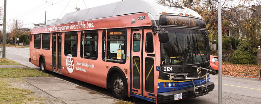 Bus wrapped in 'Copper Pilot' information