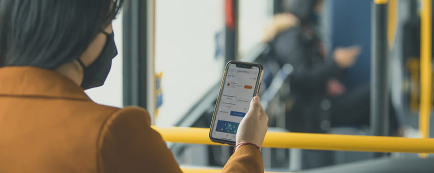 Passenger browsing translink.ca on their phone