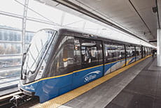 A SkyTrain stopped at a station