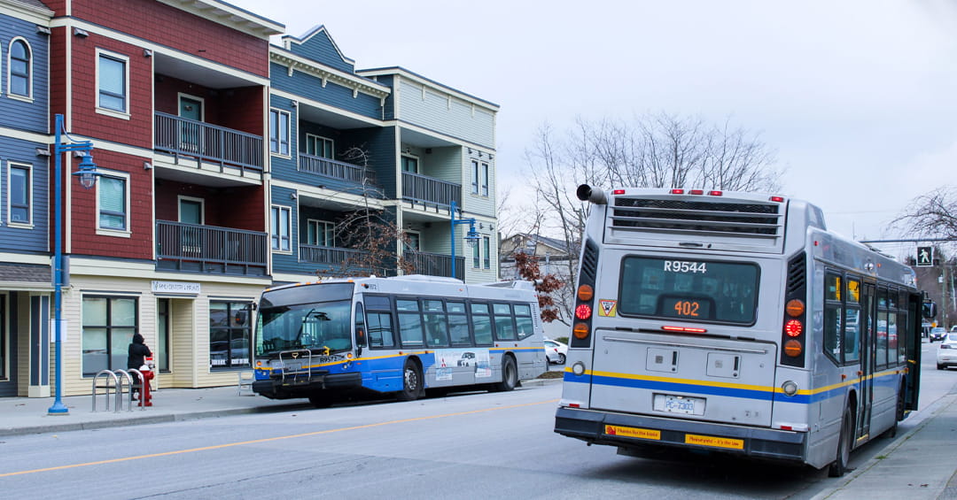 Two buses stopped at the Steveston Bus Exchange