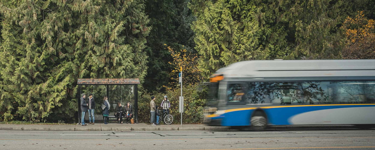 TransLink Bus arriving at bus stop to pick up customers