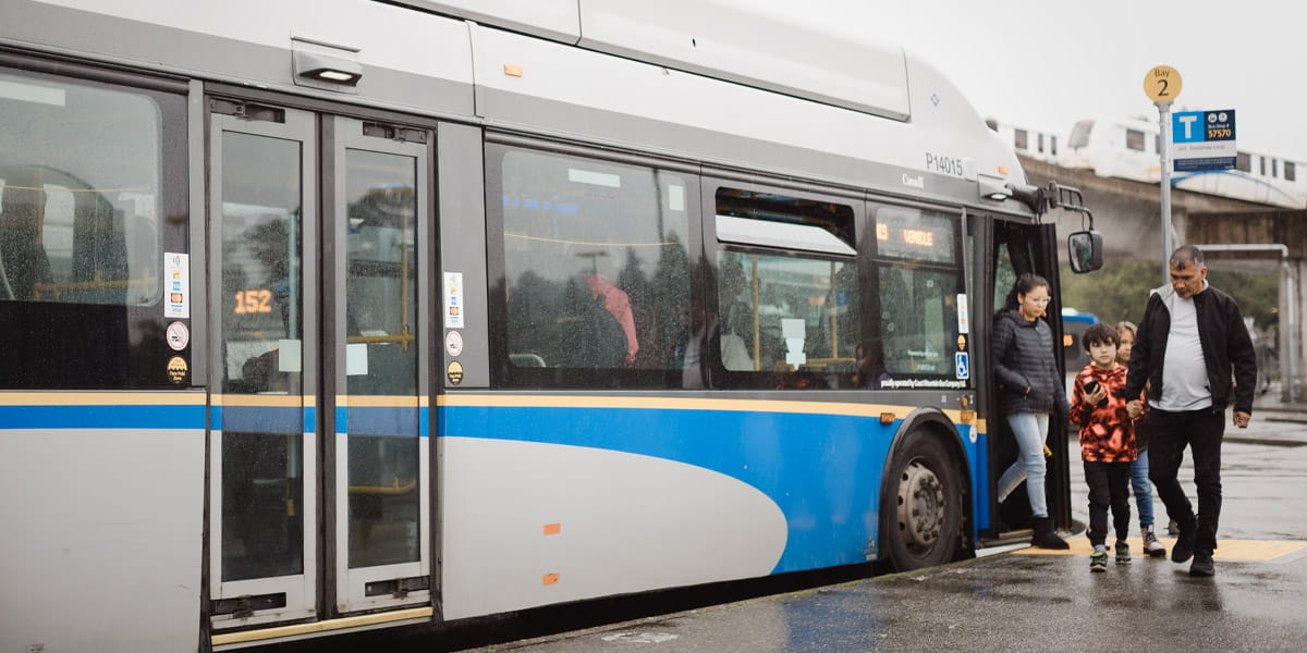 Passengers getting off the bus at bus bay 2