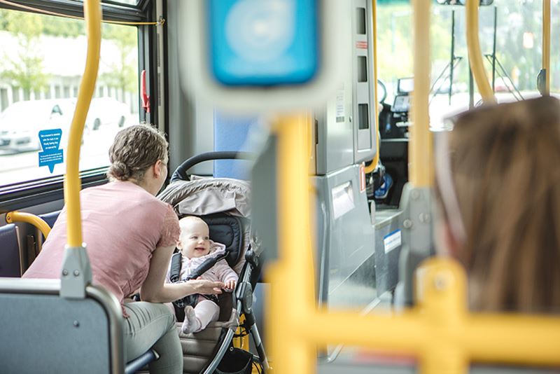 A mother and a baby on the bus