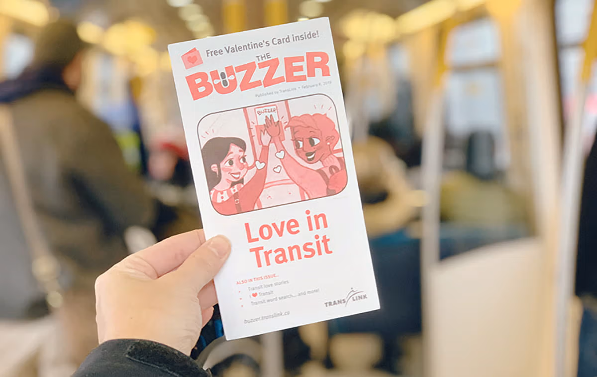 Someone holding a copy of the Buzzer