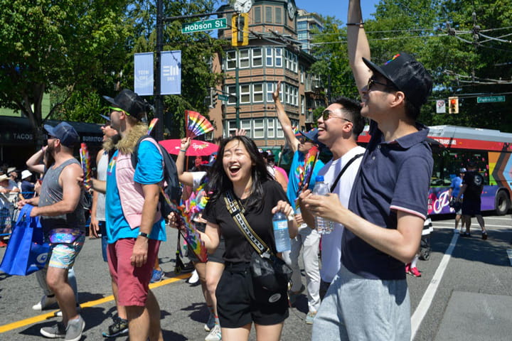 Cheerful TransLink employees at the 2022 Pride Parade