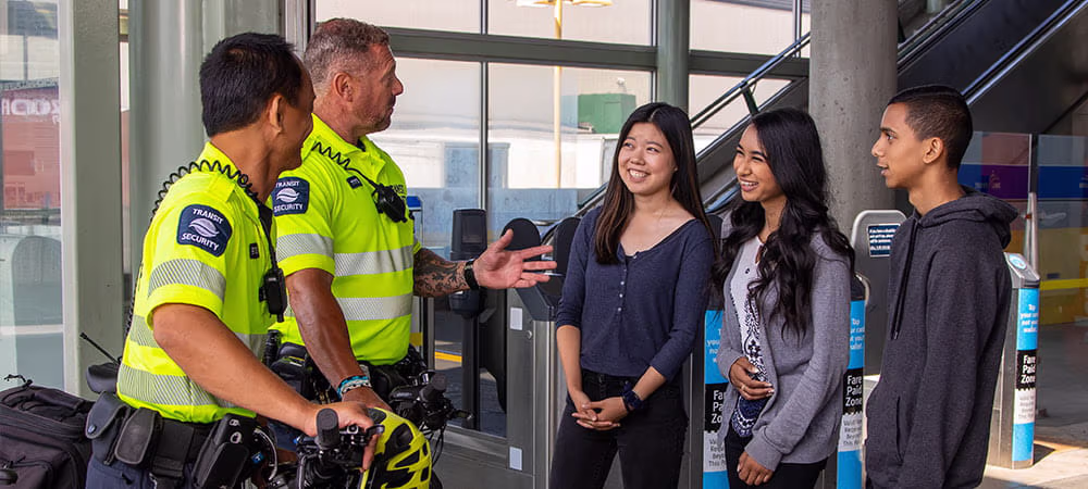 Transit Security speaking with a group of kids
