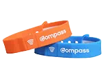 orange and blue compass wristbands next to each other