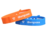 orange and blue compass wristbands next to each other