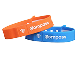 orange and blue compass wristbands next to each other
