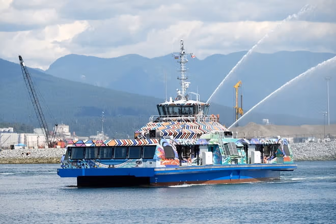 Burrard Chinook with art and water salute