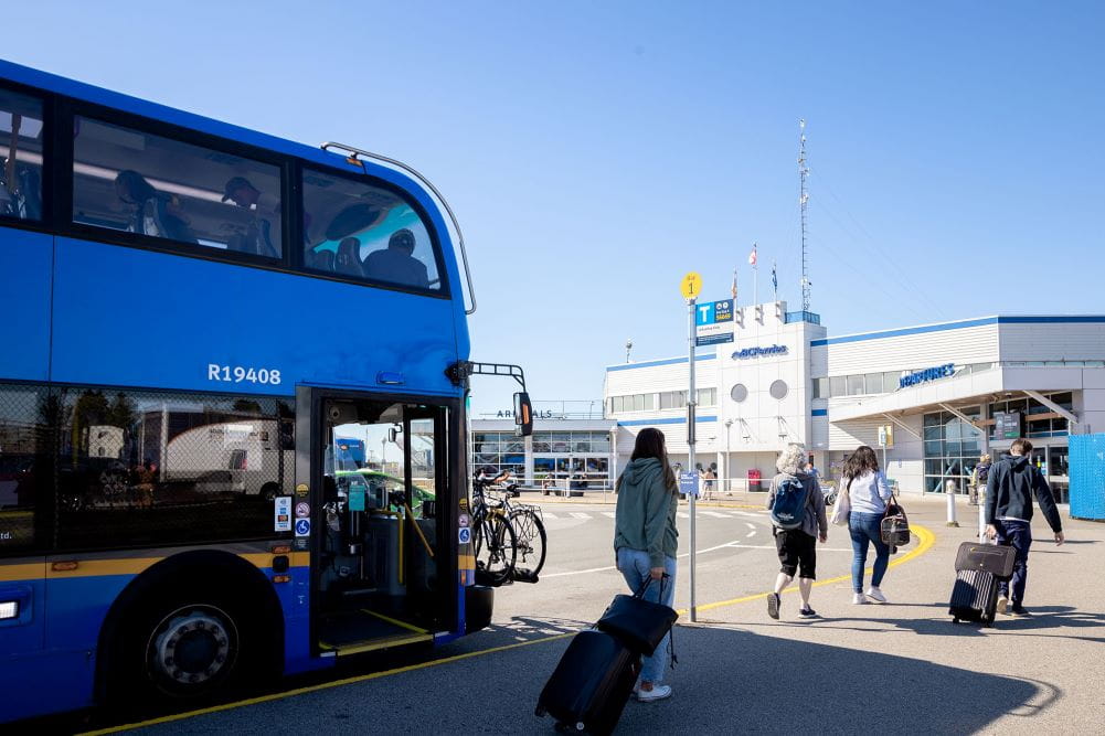 620 bus parked at bus stop near foot passenger arrivals and departures area of Tsawwassen Ferry Terminal.