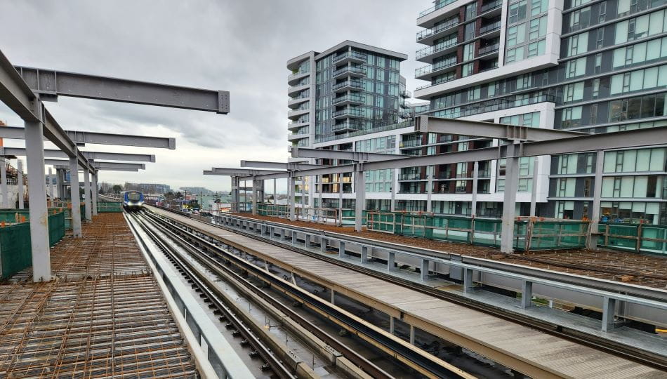 View of Capstan Station construction site near SkyTrain guideway