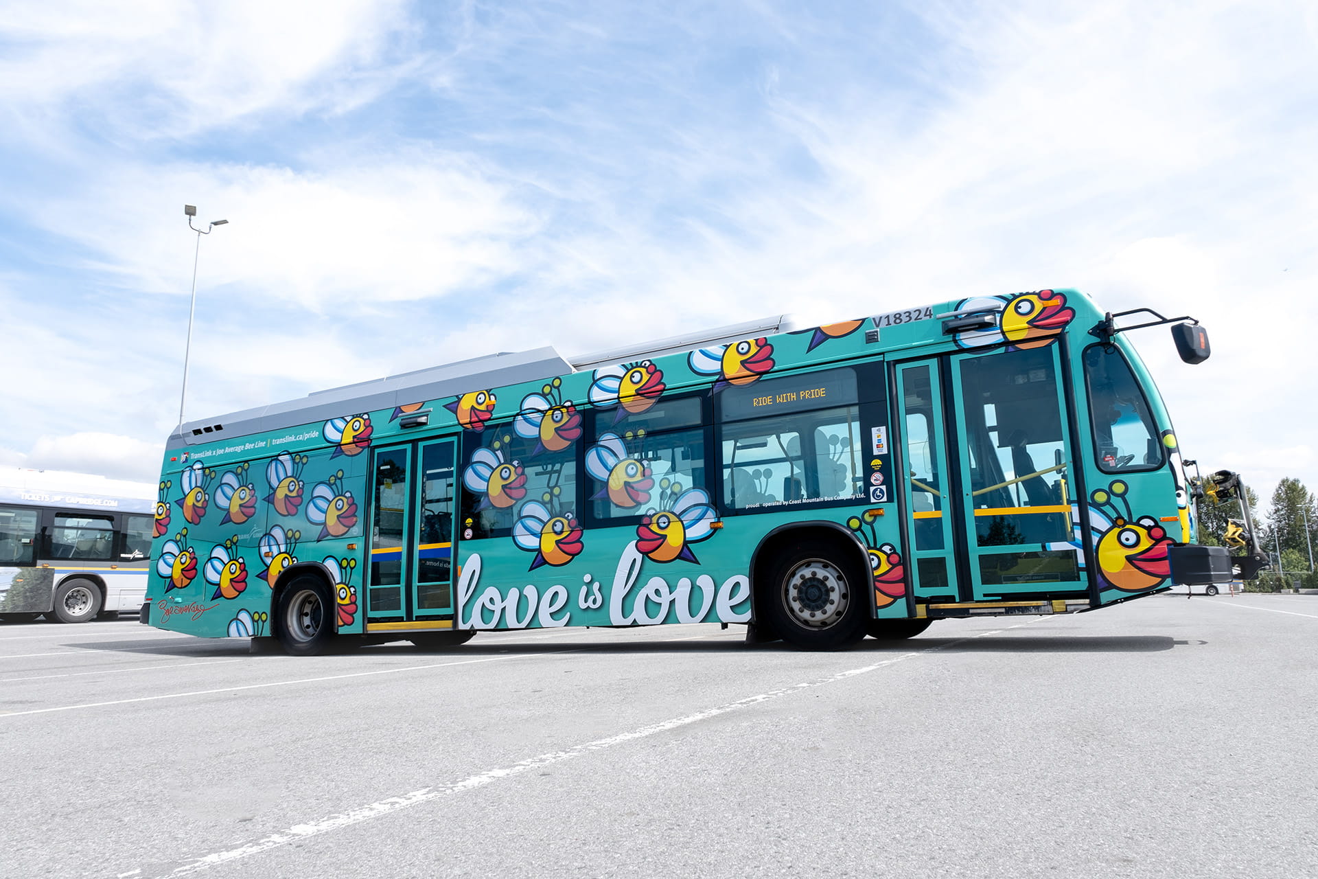 The PrideBus decorated with a special pride-themed art designed by local artist Joe Average