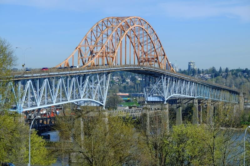Wide shot of Pattullo Bridge on sunny day.