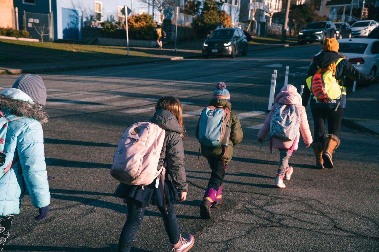 Children crossing street while participating in Walking School Bus Program.