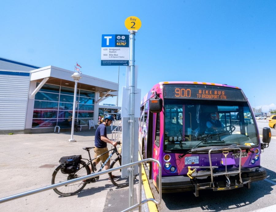 Cyclist boarding 900 Bike Bus at Tsawwassen Ferry Terminal