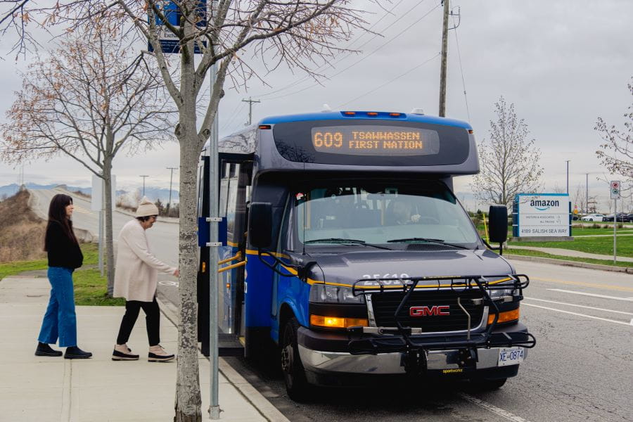 Two customers getting on 609 bus in Tsawwassen